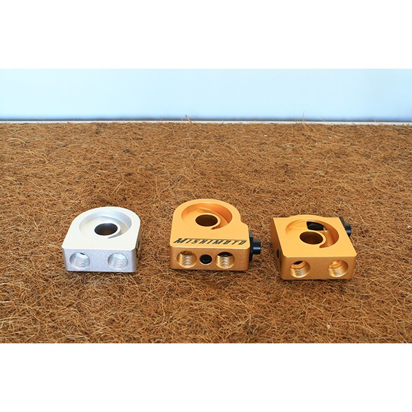 Sandwich de aceite Mishimoto M22 x 1,5 con termostato trasero Sandwich de aceite Mishimoto M22 x 1,5 con termostato trasero